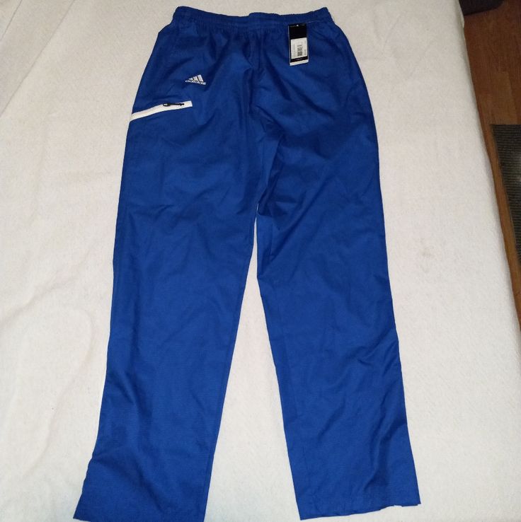 Brand: Adidas Style: Team Sports Woven Pants Color: Collegiate Royal Blue/ White Size: Small Has Zippers On The Legs, Drawstring At The Waist And Two Front Hand Pockets And One Pocket On The Right Leg. Nwt. No Box. Pet And Smoke Free Home Bin#234 Adidas Sportswear Sweatpants With Pockets, Adidas Jogging Bottoms With Pockets, Blue Adidas Activewear For Jogging, Adidas Joggers With Pockets For Sports, Adidas Sportswear Pants With Moisture-wicking, Blue Full-length Sportswear Pants, Adidas Blue Sweatpants For Jogging, Adidas Stretch Moisture-wicking Pants, Adidas Moisture-wicking Sportswear Pants