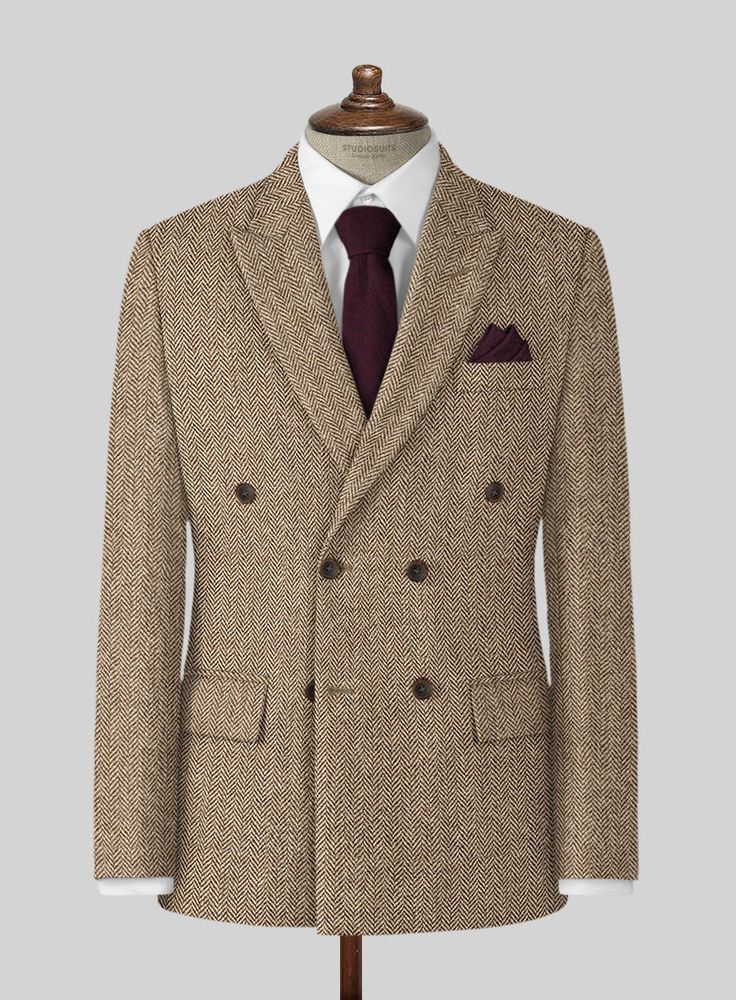 The Irish Brown Herringbone Tweed Jacket will become the standard of business dressing and by far the most ubiquitous option. Crafted from wool, the Irish Brown color of the jacket will surely influence a veteran dresser to buy the jacket for building a sharp wardrobe. Team it up with matching trousers, white shirt and dark brown derby shoes. 
 
 Look Includes  Irish Brown Herringbone Tweed Fabric  Double Breasted Jacket Style  Peak Lapel  Horn Brown Buttons  Single Vent  Three Cuff Buttons   Yo Formal Tailored Tweed Sport Coat, Tailored Tweed Sport Coat For Formal Occasions, Tweed Blazer With Suit Collar For Semi-formal Occasions, Semi-formal Tweed Blazer With Suit Collar, Semi-formal Herringbone Tweed Jacket, Business Tweed Jacket With Herringbone Pattern, Herringbone Tweed Jacket For Business, Formal Tweed Sport Coat With Notch Lapel, Formal Tweed Jacket With Welt Pockets