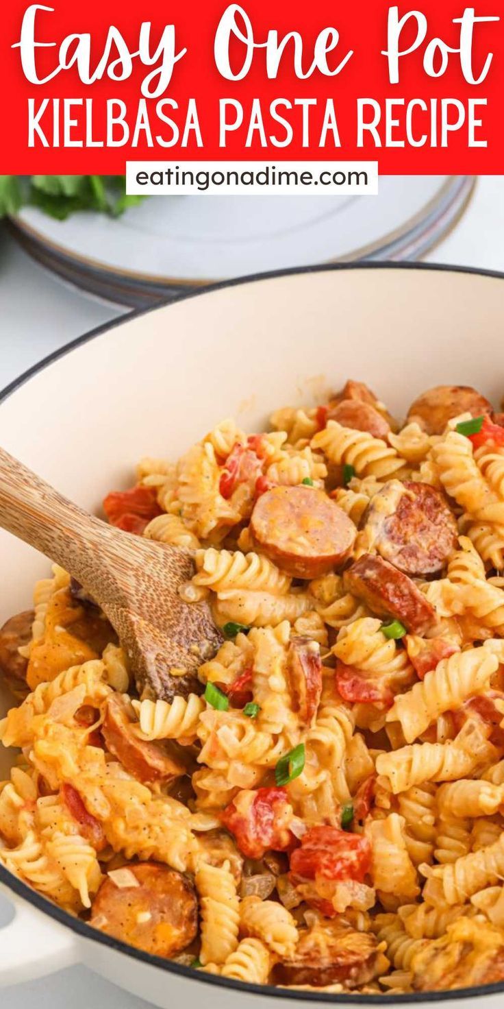 one pot kielbasa pasta recipe with sausage and tomatoes in a skillet, ready to be eaten