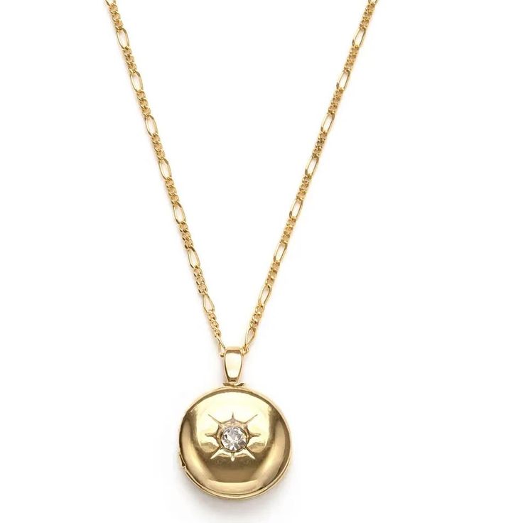 Small round locket with Czech crystal on 20" fine chain, made of brass with a 14k gold plate. Designed and assembled in our Sonoma, CA studio.Made in United States of America Elegant 14k Gold Round Locket Necklace, Round Tarnish Resistant Locket Necklace Gift, Gold Locket Necklace With Vintage Charm And Round Pendant, Gold Plated Locket Medallion Necklace Pendant, Gold Plated Medallion Pendant Necklace With Locket, Gold Round Locket Necklace, Gold Plated Locket Necklace With Round Pendant, Dainty Round Locket Charm Necklace, Gold Plated Round Pendant Locket Necklace