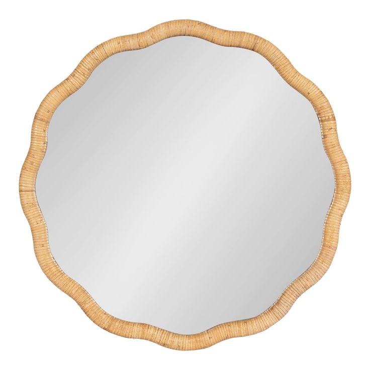 a round mirror that is made out of wood and has a wicker frame around it