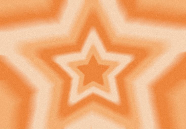 an orange and white background with a star in the center