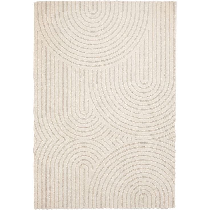 a white rug with wavy lines on the bottom and an oval design in the middle