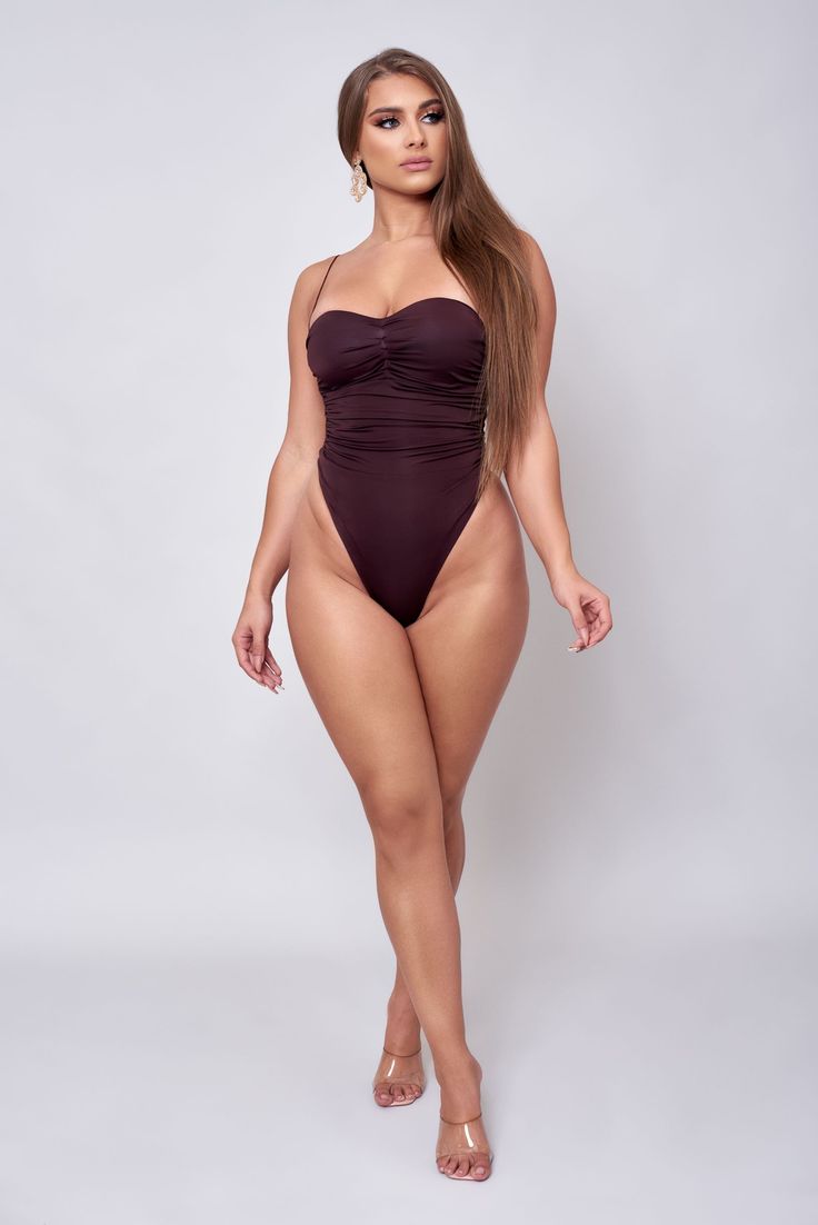 Night out layering is made easy with this point bodysuit will complete with thong back and smooth fit. Coco Brown Also available in Dusty Rose Snap closure Wire Push up bra Lined Thong back Machine wash Model wearing MEDIUM Spaghetti Strapped Lined Bodysuit For Night Out, Spaghetti Strap Bodysuit With Lined Body For Night Out, Spaghetti Straps Bodysuit With Lined Body For Night Out, Solid Backless Bodysuit With Built-in Bra, Backless Bodysuit With Boning, Backless Shapewear With Lined Body, Seamless Backless Leotard, Stretch Underwire Bodysuit For Night Out, Underwire Bodysuit With Built-in Bra For Night Out