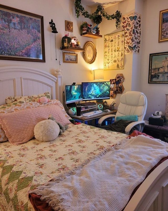 a bedroom with a bed, chair and computer desk