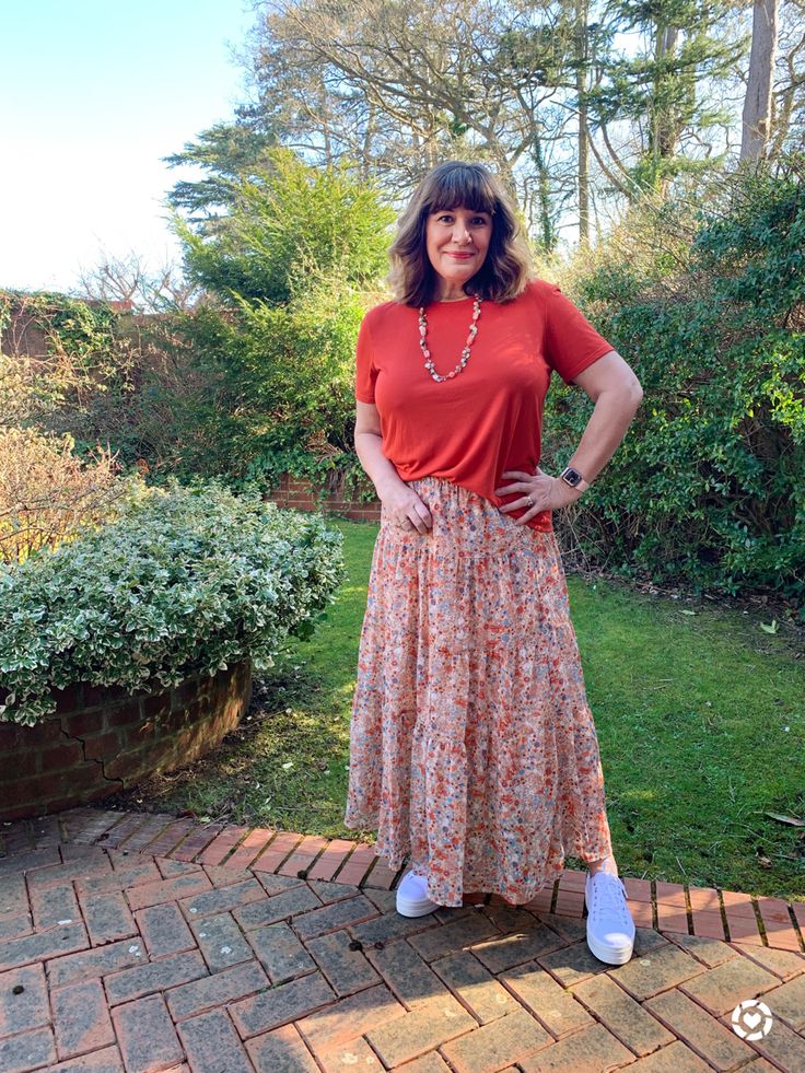 Spring outfit idea. Floral print maxi skirt, orange t-shirt and platform white trainers Follow me in the @LIKEtoKNOW.it shopping app to shop this post and get my exclusive app-only content! #liketkit #LTKeurope #LTKstyletip #LTKSeasonal @liketoknow.it http://liketk.it/3ao4C Floral Skirt Outfits, Spring Outfit Idea, Floral Print Maxi Skirt, Floral Pleated Skirt, Print Maxi Skirt, Orange T Shirt, Skirt And Sneakers, Orange T Shirts, Floral Maxi Skirt