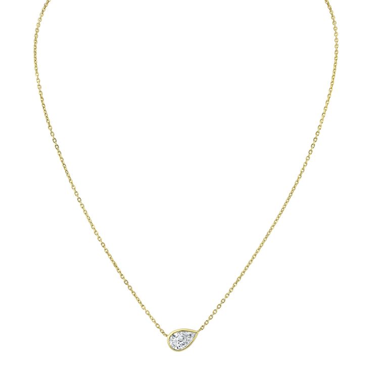 Experience the exquisite beauty of our Pear Shape Diamond Bezel Pendant, exuding a unique East West style. This pendant is a luxurious work of art, meticulously crafted to showcase the brilliance of the pear-shaped diamond. Set in a delicate bezel, the diamond's natural radiance takes center stage, adding a touch of timeless sophistication to your ensemble. Pear Diamond Pendant, Pear Diamond Necklace, Pear Shaped Diamond Necklace, Bezel Set Necklace, Pear Pendant, Bezel Pendant, Pear Shaped Diamond, Pear Diamond, Diamond Set