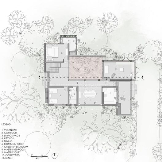 an architectural drawing of a house surrounded by trees and bushes, with the floor plan outlined in pink