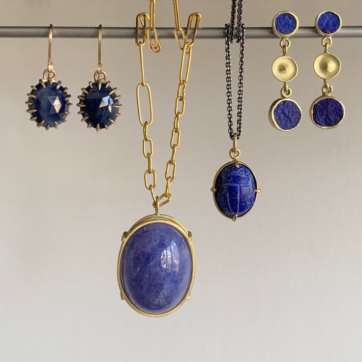 Deep royal blue and opulent gold make a perfect match in these lithe triple drops. 18k & 14k green gold Lapis lazuli Circles are graduated in size from 6mm (1/4") in diameter to 8mm (5/16") diameter Earrings hang 1 1/16" from the ear Ancient Pharaohs, Temple Earrings, Scarab Pendant, Deep Royal Blue, Newport Ri, Oxidized Sterling Silver, Conflict Free Diamonds, Green Gold, Lapis Lazuli