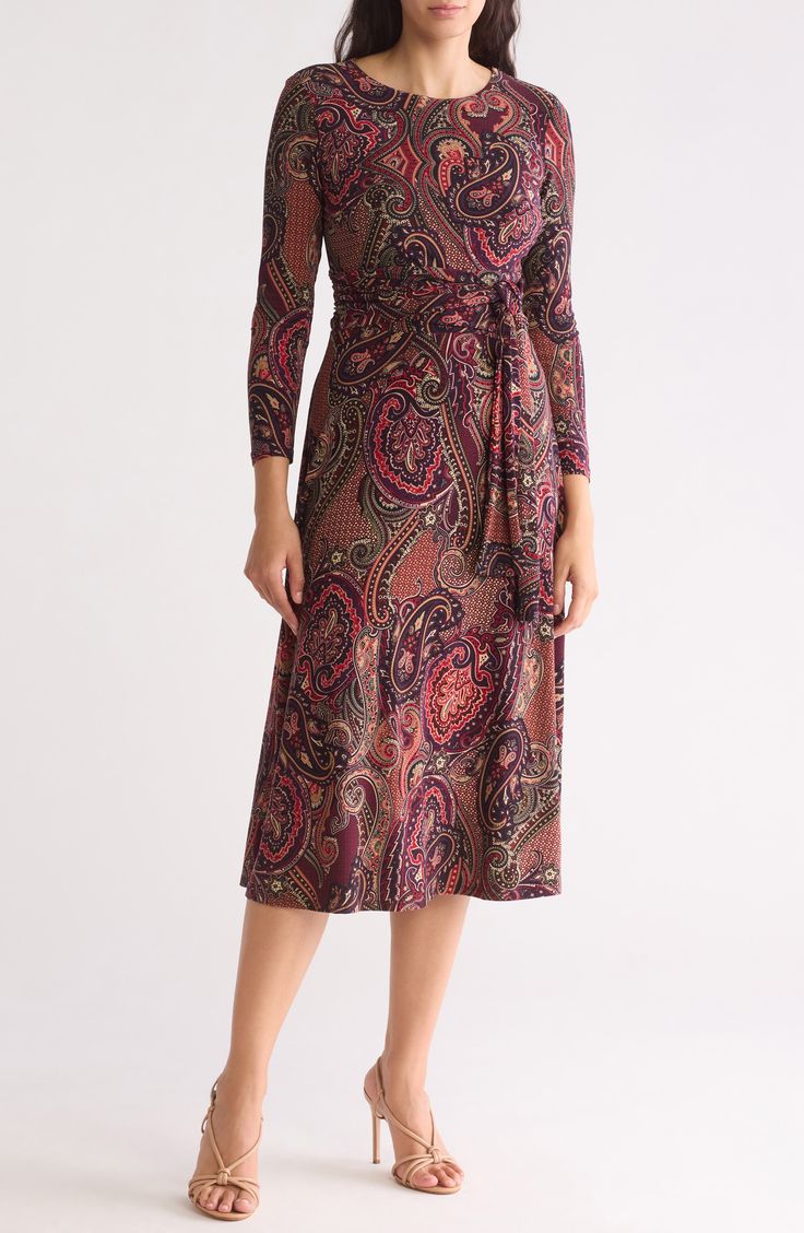 Perfect for the office or a nice dinner, this long-sleeve dress framed by long sleeves is covered in a charming paisley pattern. 46 1/5" length (size 2) Back zip closure Jewel neck Long sleeves Machine wash, dry flat Imported Elegant Patterned Midi Dress For Fall, Elegant Paisley Print Dress, Elegant Paisley Print Dress For Work, Elegant Patterned Dresses, Elegant Fitted Midi Dress With Paisley Print, Fitted Paisley Print Dress For Fall, Elegant Fitted Midi Dress By Tommy Hilfiger, Fitted Paisley Print Fall Dresses, Tommy Hilfiger Elegant Midi Dress