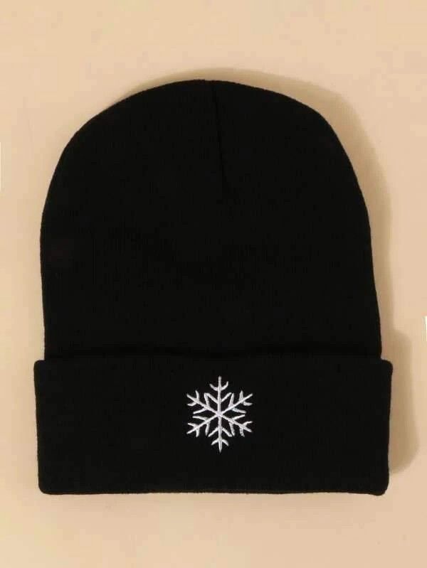 a black beanie with a white snowflake on it