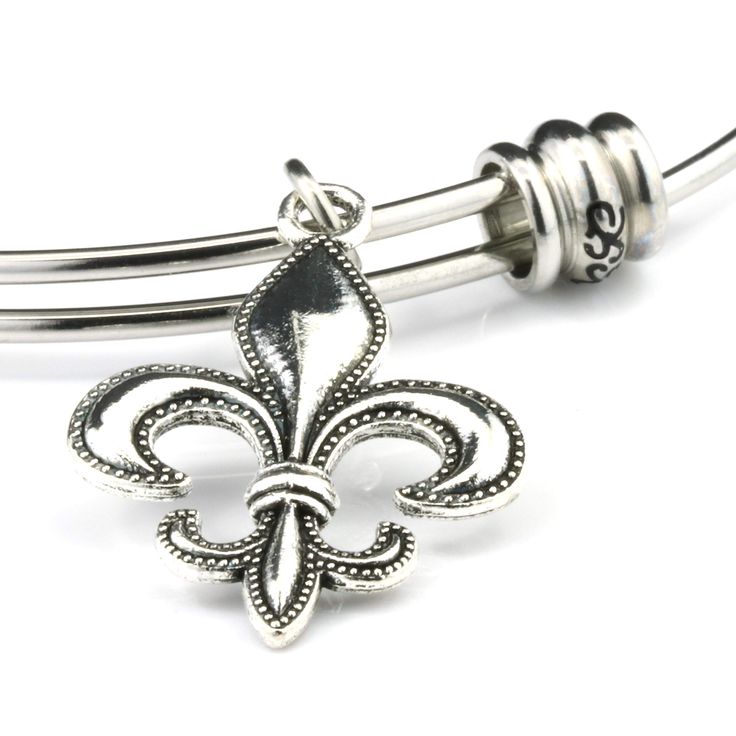 PRICES MAY VARY. Fleur de Lis Jewelry for Women that love the Saints or have origins with the Fleur de Lis History A Charm for Louisiana Jewelry or Louisiana Gifts for Women or Fans of the New Orleans Saints Fluer de Lis Jewelry for those with French Origins or for those that are LSU Students or Faculty LSU Bracelets for Women with Fleur de Lis Charm or Fleur de Lis Emblem for Women or Men New Orleans Saints Jewelry for Women on a Stainless Steel Bangle with a Fleur de Lis Charm Fleur de Lis Gif Classic Adjustable Charm Bangle Bracelet, Classic Adjustable Bangle Charm Bracelet, Classic Adjustable Nickel-free Charm Bracelet, Louisiana Jewelry, Louisiana Gifts, Fluer De Lis, French Royalty, Saint Jewelry, Stainless Steel Bangles