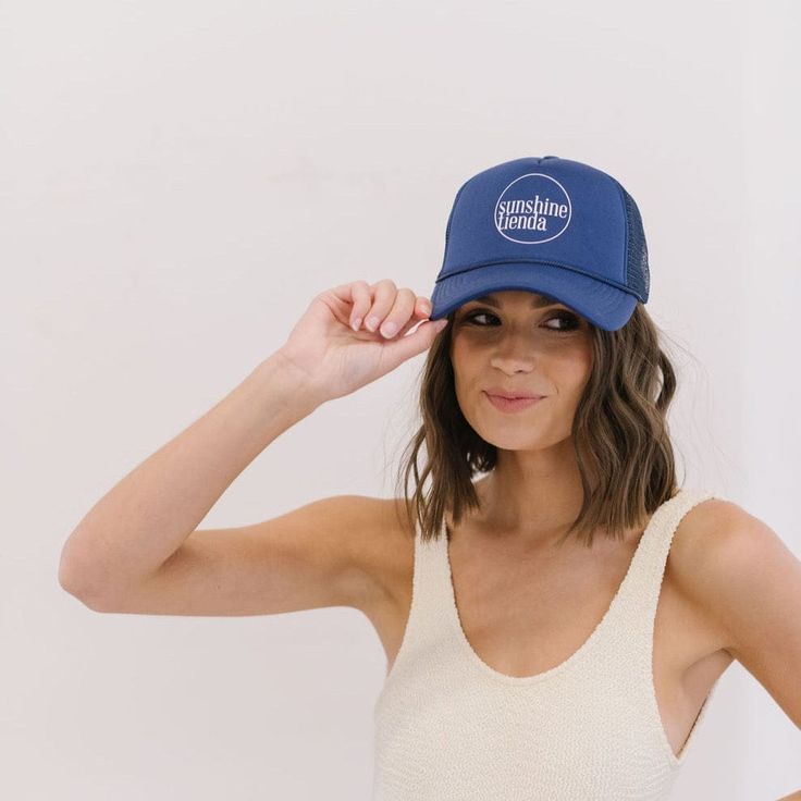 We are loving our Sunshine Tienda trucker hats! We wanted a fun and casual on brand option for all year long. These hats are breathable and adjustable. We can't wait to see you rocking our cute merch! Color: Navy and White Size: One Size Fits All Material: Embroidered Cotton and Mesh Fabric ALL SALES FINAL Cute Merch, We Are Love, You Rock, Trucker Hats, Mesh Fabric, One Size Fits All, Navy And White, See You, Trucker Hat