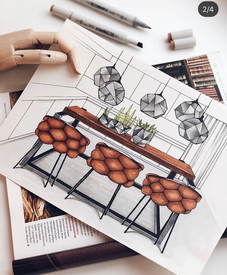 a drawing of a table with chairs and umbrellas on it next to some books