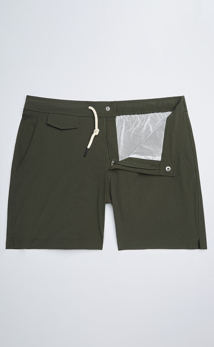 A classic piece for summer, our swim shorts provide elegant styling at the beach or by the pool. The nylon/spandex blend fabric is quick-drying and offers comfortable stretch. The elasticated waistband is designed for a comfortable, flexible fit, and the traditional waist drawstring keeps them securely fastened. Other details include a YKK zipper fly and multiple pockets for plenty of storage space. A smart look both in and out of the water, you can wear them for a swim or grabbing drinks at a poolside bar. Summer Swimwear With Built-in Shorts And 4-way Stretch, Solid Nylon Swimwear With Built-in Shorts, Nylon Bottoms With Built-in Shorts For Beach Season, Sporty Nylon Swimwear For Travel, Adjustable Waist Swim Trunks For Summer, Nylon Swim Trunks With Drawstring And Relaxed Fit, Relaxed Fit Nylon Swim Trunks With Drawstring, Solid Swimwear With Built-in Shorts, 4-way Stretch Swimwear For Summer Pool