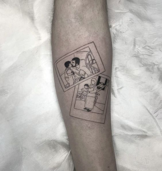 a person with a tattoo on their arm and the image of two people is shown