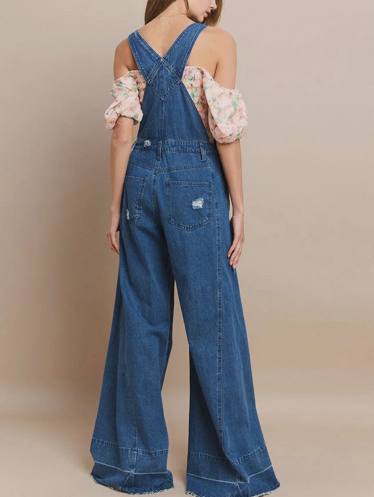 Embrace the bold and adventurous style of our Wide Leg Distressed Denim Overalls! These overalls feature a wide leg design and distressed details, perfect for those who love taking risks and standing out. Made with high-quality denim, these overalls are both fashionable and functional for any occasion. Experience ultimate comfort and style with our Wide Leg Distressed Denim Overalls! These jumpsuits are designed for women who want to feel comfortable without compromising on their fashion sense. Taking Risks, Denim Accessories, Leg Design, Denim Overalls, Fashion Sense, Distressed Denim, Denim Dress, Overalls, Wide Leg