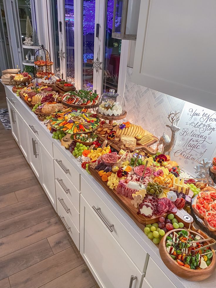 a buffet with many different types of food on it