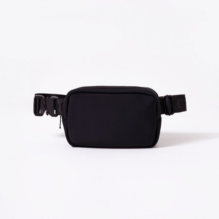 The Everyday Fanny Pack: the perfect hands-free, on the go essential. With zip pockets inside and out, a mesh compartment, an adjustable waist strap for easy fastening or shoulder wear, and sleek neoprene material that makes it machine washable, this fanny pack is a closet staple. Stay organized, hands-free, and ready for anything with this stylish fanny pack. Everywhere Belt Bag Lululemon Black, Black Belt Bag With Removable Pouch, Modern Black Pouch Belt Bag, Practical Black Nylon Belt Bag, Stylish Fanny Pack, Black Belt Bag With Anti-theft Pocket For On-the-go, Perfect Hands, Black Fanny Pack, Fitness Jewelry