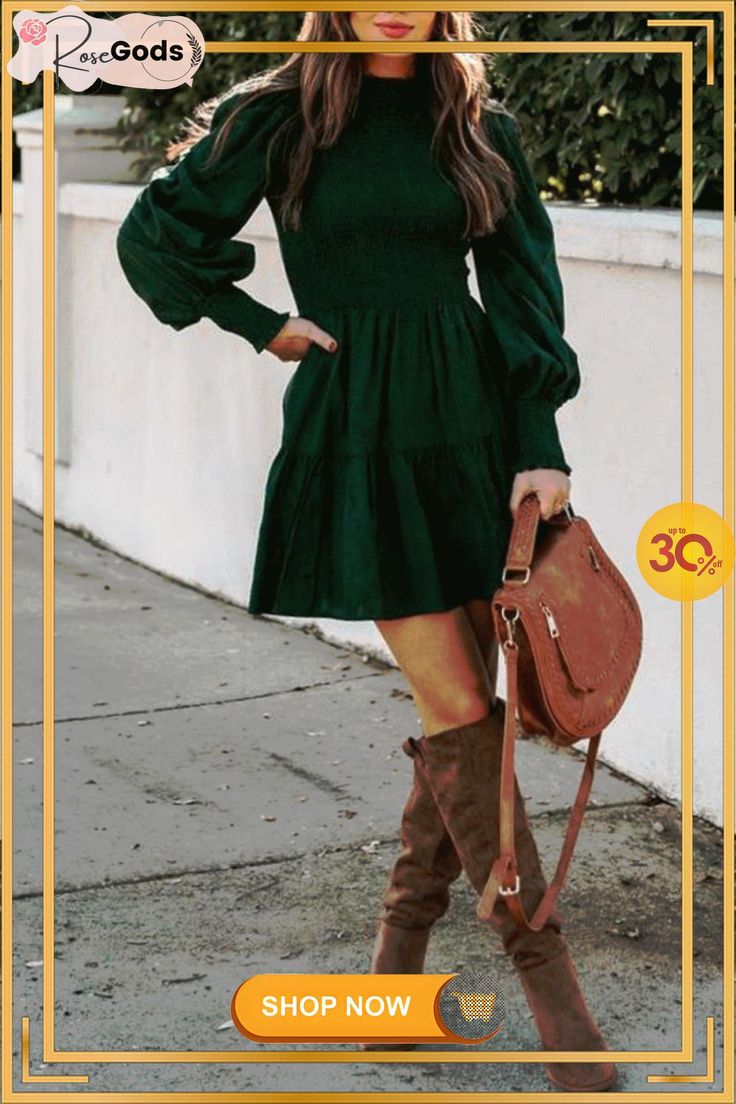 a woman in a green dress and brown boots