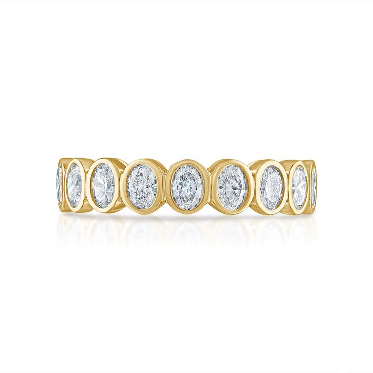 The Bezel Set Oval Eternity Band features 18 beautiful oval cut stones and is the perfect piece to wear on its own or to add to your stack. Available in 18K White, Yellow, and Rose Gold Diamond weight = 1.38 carats This item is FINAL SALE Oval Diamond Cut Eternity Band, Oval Brilliant Cut Yellow Gold Eternity Band, Classic Oval Eternity Band, Elegant Oval Halo Eternity Band, Luxury Oval Eternity Band For Anniversary, Elegant Gold Oval Eternity Band, Elegant Oval Gold Eternity Band, Oval Yellow Gold Eternity Band For Anniversary, Classic Oval Yellow Gold Eternity Band