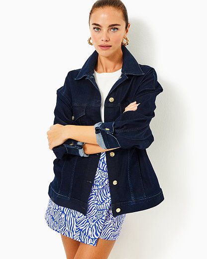 Easy fit, long sleeve, button front denim jacket. 27" in length (based on a size small/4). Skims the body. Roomier fit.  Repreve® Denim (74% Cotton, 24% Repreve Recycled Polyester, 2% Spandex). Machine wash cold, delicate cycle, separately, or dry clean. Imported. Layer any look with our timeless Brixley Denim Jacket. Chic Relaxed Fit Long Sleeve Denim Jacket, Chic Dark Wash Relaxed Fit Denim Jacket, Chic Long Sleeve Denim Jacket With Button Cuffs, Chic Denim Jacket With Button Cuffs, Outerwear Jackets, Lilly Pulitzer, Denim Jacket, Top Brands, Dry Clean