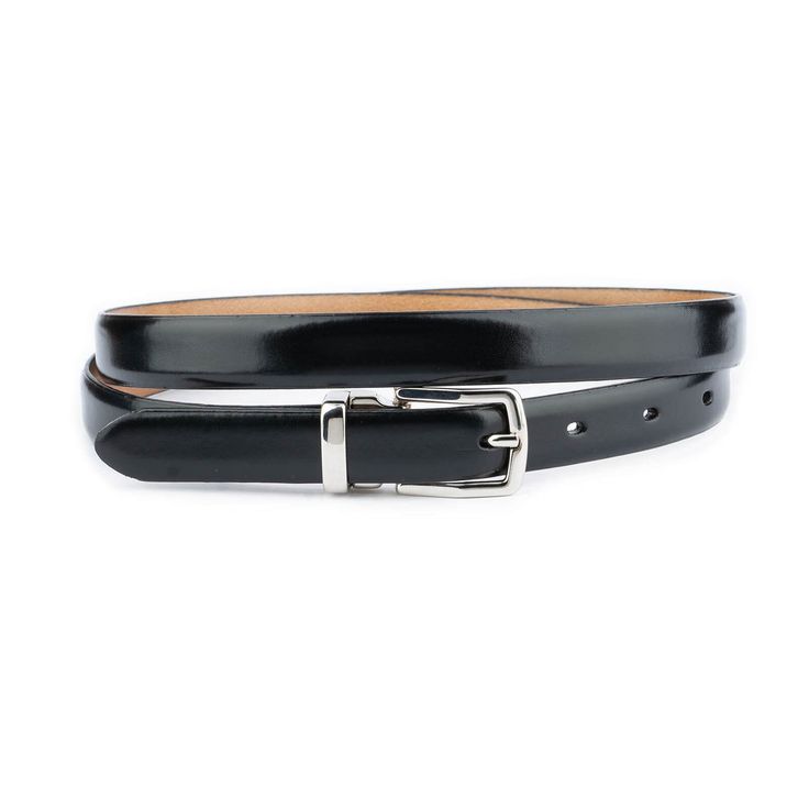 Introducing our Thin Black Belt with Silver Buckle, a sleek and versatile accessory designed to complement your dresses with elegance and style. Crafted from genuine leather, this belt combines quality craftsmanship with timeless design, ensuring both durability and sophistication. With a width of 2.0 cm (3/4 inches), this belt offers a subtle yet stylish accent to your ensemble, perfect for cinching your waist and adding definition to your silhouette without overpowering your outfit. The classi Black Belt Silver Buckle, Belt For Dresses, Belt Black, Suspender Belt, Belt Size, Metal Buckles, Belted Dress, Black Belt, Suspenders