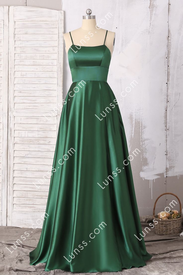 This chic emerald green satin A-line floor length formal gown features fitted bodice with spaghetti straps, curved neckline and strappy low back. The sexyhigh slit A-line skirt with pockets completes the whole look. Custom size and color are available. Emerald Green Winter Formal Dresses, Green Silk Formal Dress, Emerald Green Prom Dresses 2023, Emerald Green Prom Dress Modest, Emerald Green Dama Dresses For Quince, Dark Green Satin Prom Dress, Green Ombre Bridesmaid Dresses, Appropriate Prom Dresses, Green Dress With Long Train