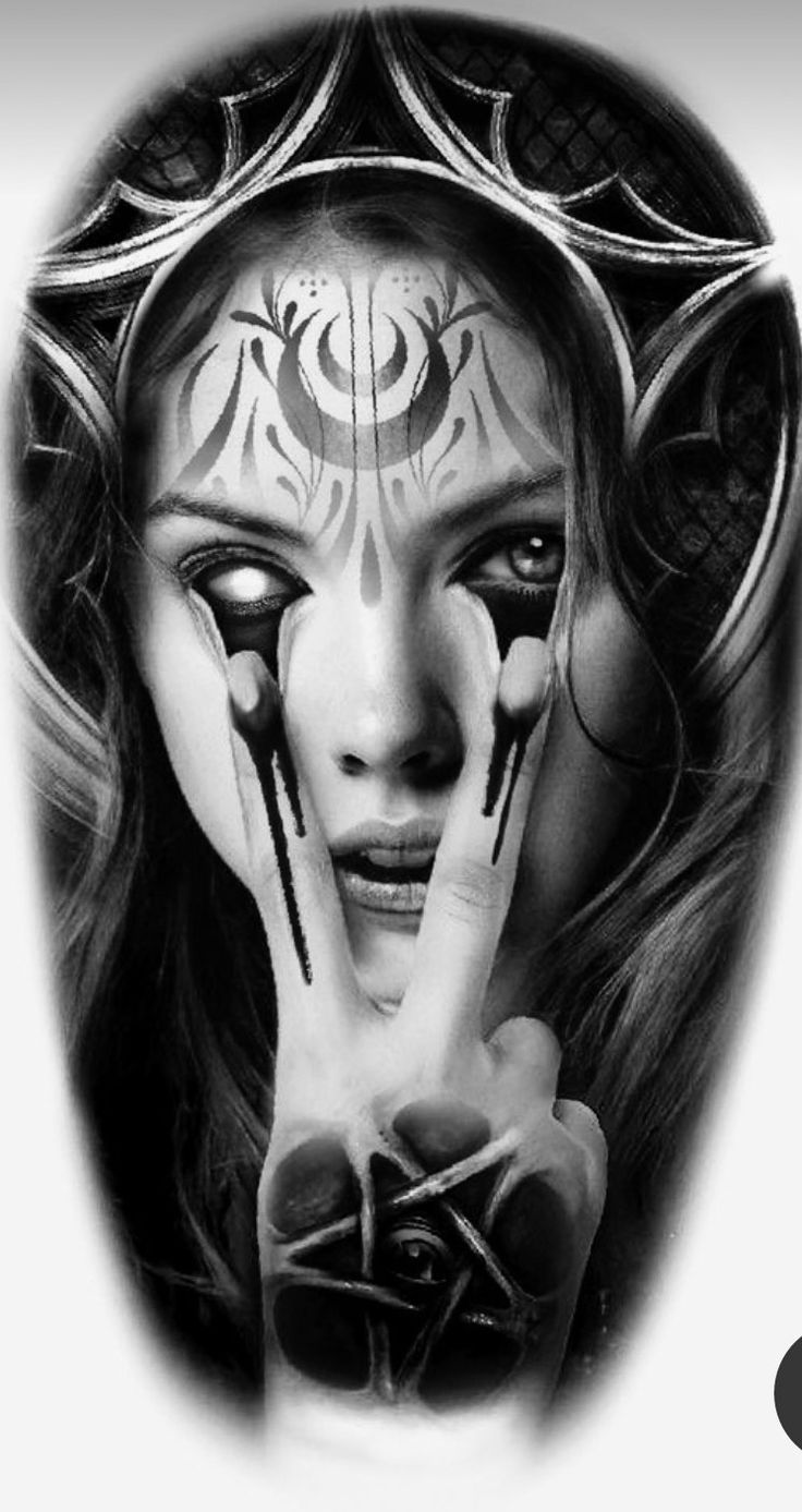 a woman's face painted in black and white with her hands on her face