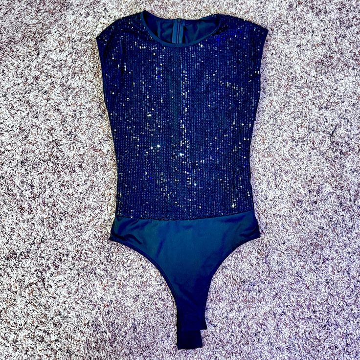 *Nwot* Small Black Sequin Bodysuit Never Been Worn, Was Too Big For Me & Couldn’t Return It. Super Cute! Glamorous Black Stretch Bodysuit, Black Sequin Bodysuit For Party, Black Sequined Party Bodysuit, Fitted Black Bodysuit With Sequins, Fitted Black Sequin Bodysuit, Glamorous Black Summer Bodysuit, Sleeveless Black Glamorous Bodysuit, Glamorous Black Sleeveless Bodysuit, Sequin Stretch Bodysuit For Club