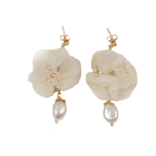 Les Couronnes de Victoire brings childhood visions of floral crowns and adornments to modern, sophisticated styling for special events, or just those days when you want some extra romance. Crafted from real flowers, these pieces are preserved using a natural biological process that keeps them fresh, soft and uniquely shaped. The Calypso Earrings call out to the magic of the Caribbean with their simple drop structure, adorned with preserved flowers and ending in a shapely freshwater pearl. Natura Drop Earrings For Spring Wedding, Floral Jewelry For Spring Weddings, Elegant Wedding Earrings For Spring, Elegant Spring Wedding Earrings, Handmade Flower-shaped Chic Jewelry, Spring Wedding Jewelry With Petal Design, Spring Wedding Jewelry In Flower Shape, Spring Wedding Drop Earrings, Elegant Adjustable Flower Earrings