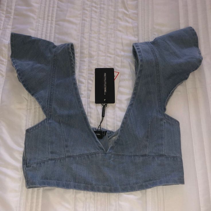 Flared Sleeve - Mid Wash - Never Worn Chic Spring Denim Top For Night Out, Chic Denim Top For Spring Night Out, Chic Denim Top For Night Out In Spring, Trendy Denim Top For Night Out In Spring, Spring Stretch Denim Top For Night Out, Stretch Denim Top For Night Out In Spring, Spring Denim Top For Night Out With Stretch, Spring Denim Top For Night Out, Trendy Stretch Denim Top For Summer