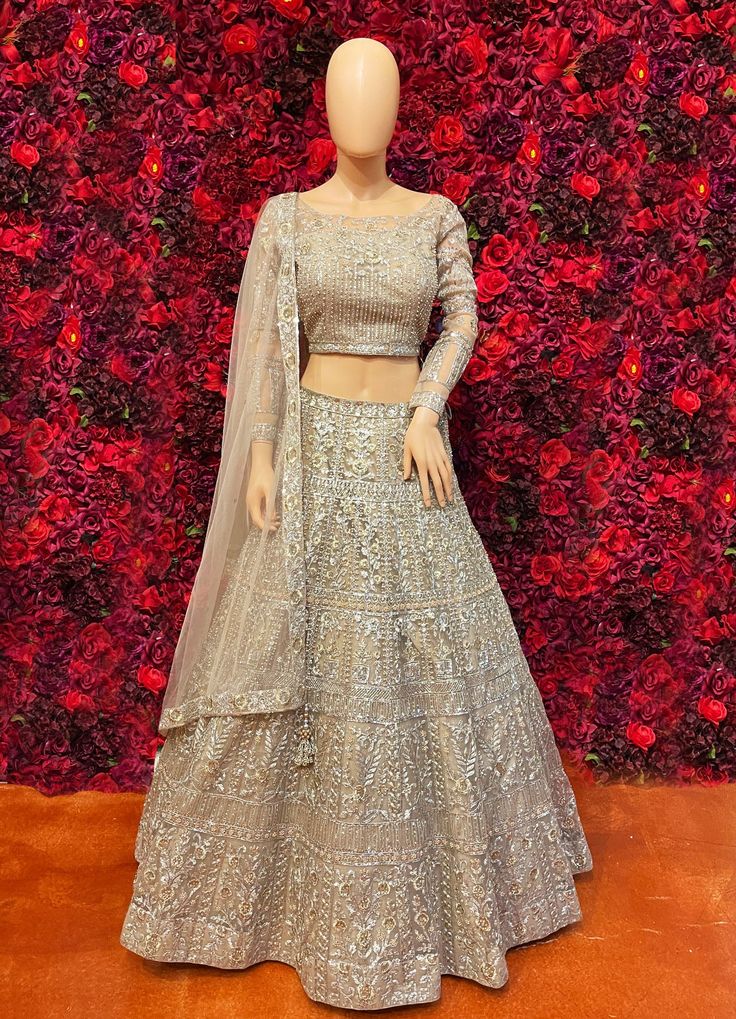 Size 36-44 Traditional Drape Gown With Stone Work For Festive Occasions, Gold Hand Embellished Choli For Eid, Festive Floor-length Sets With Stone Work, Traditional Drape Choli With Stone Work For Reception, Festive Gown With Stone Work And Traditional Drape, Bollywood Style Sets With Stone Work For Reception, Gold Hand Embellished Lehenga For Wedding, Elegant Festive Choli With Stone Work, Stone Work Choli For Reception With Traditional Drape