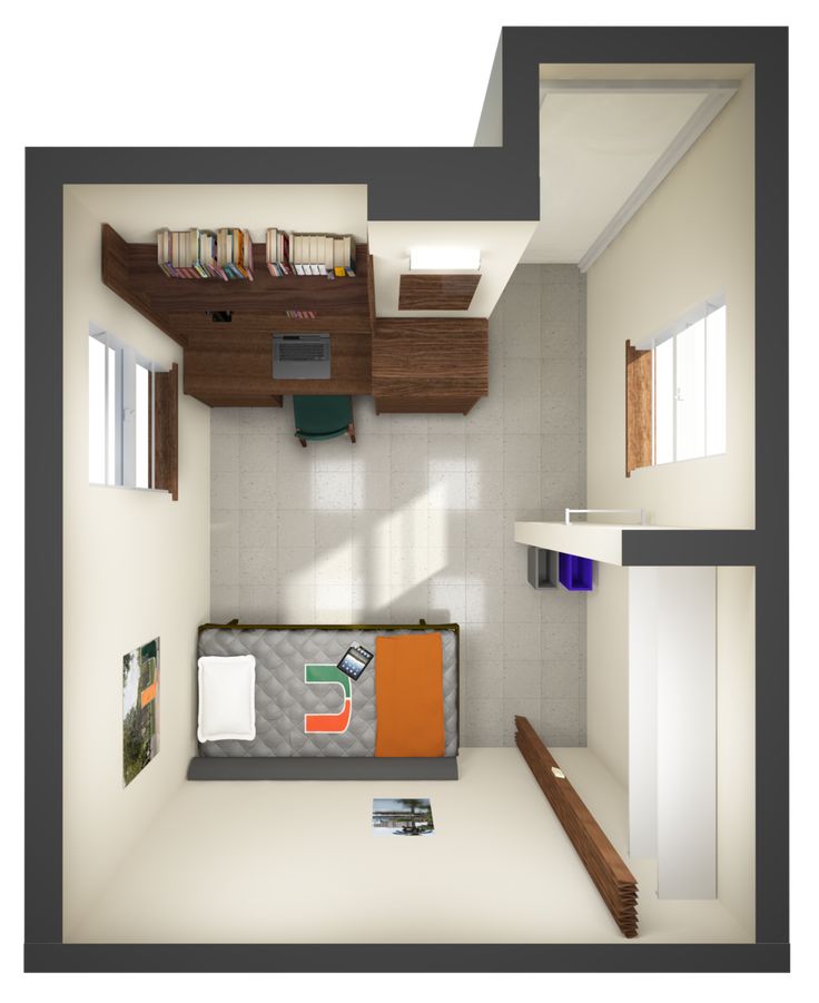 an overhead view of a small room with bookshelves and shelves on the wall