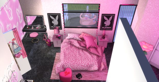 a bedroom with pink walls and black carpet