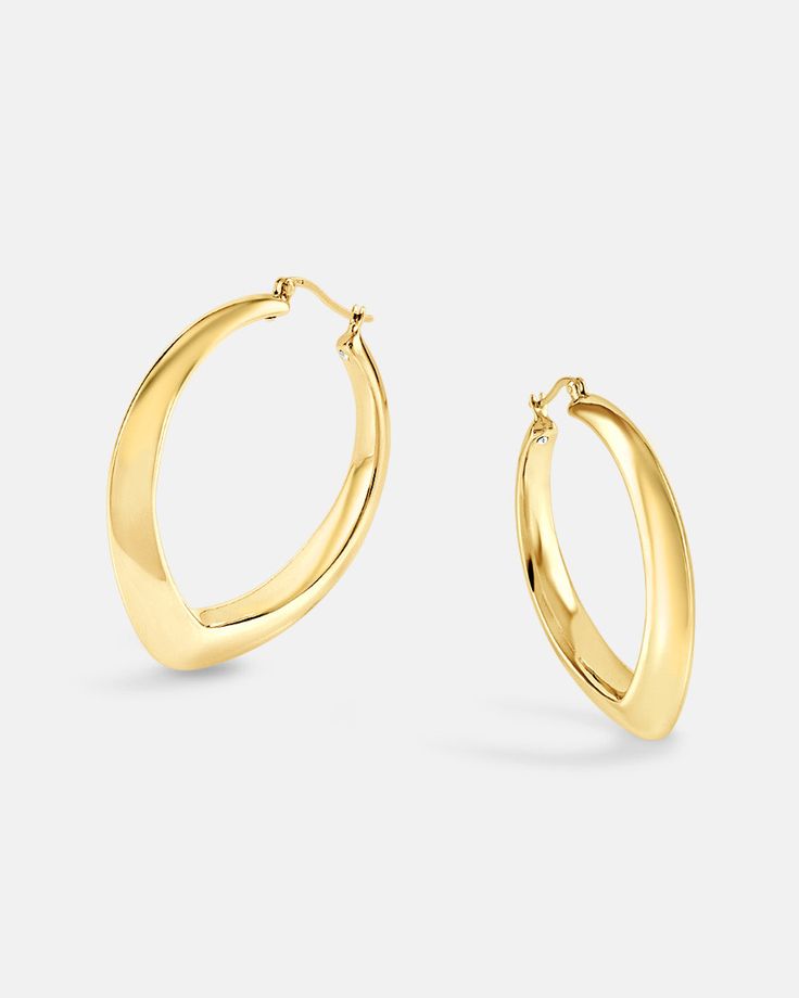 The Aria Hoop Earrings are one of our signature pieces, featuring an oversized teardrop shape with a modern, clean look. Crafted in 18K gold-plated sterling silver, these hoops come in two colors: yellow gold for a rich, luxurious vibe or white gold for a sleek, polished finish. Despite their bold design, they remain lightweight and comfortable, thanks to our Italian electroforming technology. Perfect as a gift for her, gift for mom, or a best friend gift, these simple, elegant earrings offer a Modern Gold Plated Polished Hoop Earrings, Luxury Chic Tarnish-resistant Hoop Earrings, Luxury Tarnish-resistant Hoop Earrings For Statement Jewelry, Luxury Gold Plated Tarnish-resistant Hoop Earrings, Luxury Modern Hoop Earrings With Gold-tone Hardware, Bamboo Hoop Earrings, Chunky Hoop Earrings, Earring Sale, Elegant Earrings