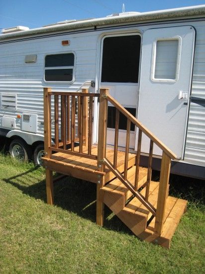 a small trailer with stairs leading up to it