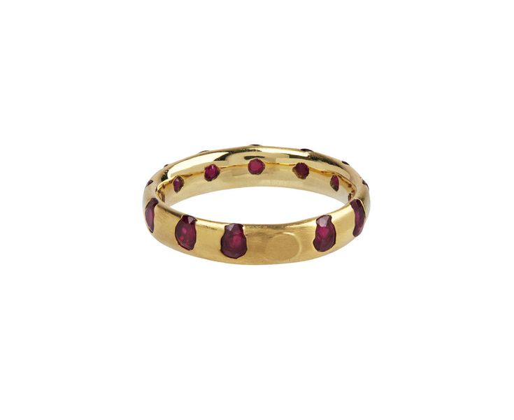 Bold and regal with its combination of 18K gold and rich rubies, this Polly Wales ring makes a stunning, modern alternative to the traditional wedding or anniversary band. The oval rubies are set directly into the 18K gold rather than cast resulting in a perfectly imperfect design. 18K yellow gold band width : 4mmrubies : vary : 2.5mm diameter to 3mm diameter eachavailable size : 6.5-please contact us for more sizing options 22k Yellow Gold Ruby Ring, Gold Ruby Rings With Round Band, Luxury Gold Ruby Birthstone Ring, 22k Yellow Gold Ruby Ring For Anniversary, Ceremonial Yellow Gold Ruby Ring, Oval Yellow Gold Ruby Ring For Ceremonial Occasions, Gold Ruby Ring With Polished Round Band, Gold Ruby Ring With Polished Finish, Luxury Yellow Gold Ruby Ring With Round Band