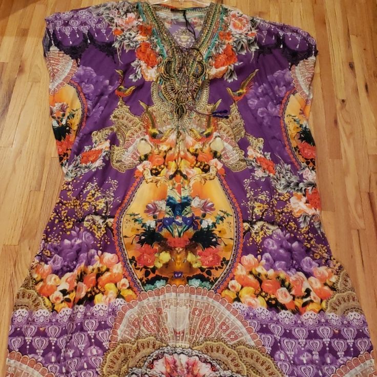 Open Shoulder Kaftan, Bright Colorful Silk Dress/ Cover Up Deep V Neck With Lace Up Neckline. Get It In Time For Cruise Season, Summer Is Right Around The Corner! 56 Inches From Back Of Neck To Floor 36 Inches From Armpit To Armpit 100% Viscose Silk Purple Floral Print Tunic Dress, Silk Purple Kaftan For Spring, Printed Purple Vacation Dresses, Purple Printed Vacation Dresses, Purple Printed Dress For Vacation, Purple Silk Kaftan For Summer, Purple Silk Floral Print Maxi Dress, Elegant Purple Summer Kaftan, Bohemian Purple Tunic For Spring