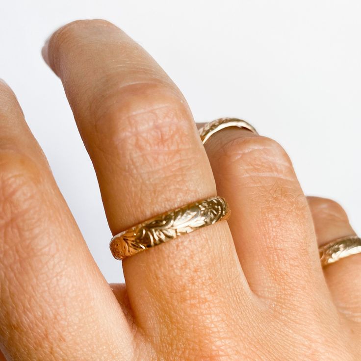 WHAT. A. STATEMENT. I absolutely adore this ring. The detail in this gold filled band is truly phenominal! If you like a more funky look, try this as midi ring or pinky ring. If your style is more classic, this is a perfect fit for your ring or middle finger. Pair it with the Chianti Cuff to save! 14kt Gold Filled or Sterling Silver Heirloom Gold Midi Rings With Round Band, Dainty Engraved Gold Round Band Ring, Gold Midi Rings Of Recycled Gold, Dainty Yellow Gold Toe Ring Bands, Heirloom Gold Midi Promise Rings, Simple Gold Engraved Promise Ring, Yellow Gold Brass Toe Stackable Rings, Everyday Gold Midi Rings Made Of Recycled Gold, Classic 14k Gold Filled Midi Promise Rings