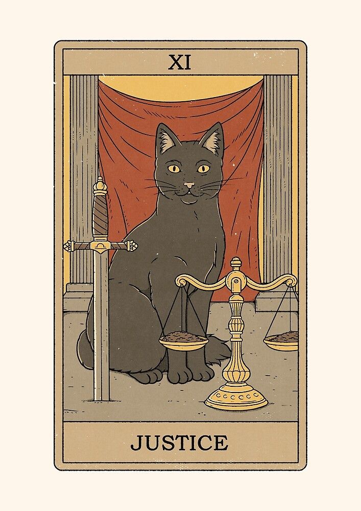 a black cat sitting on top of a tarot card