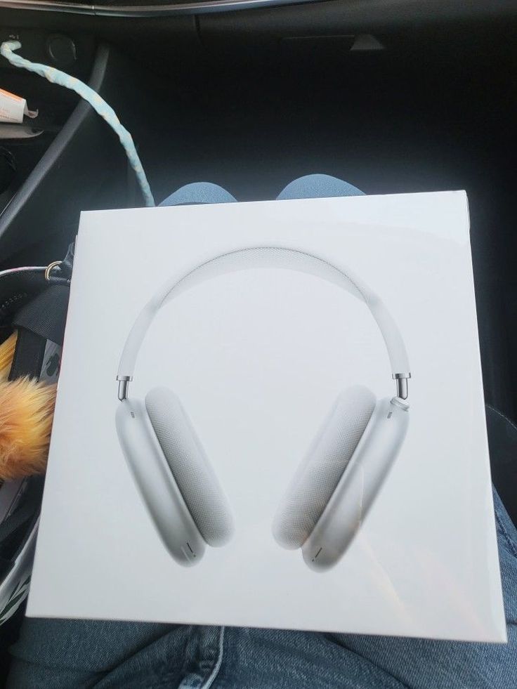 a white box with headphones in it