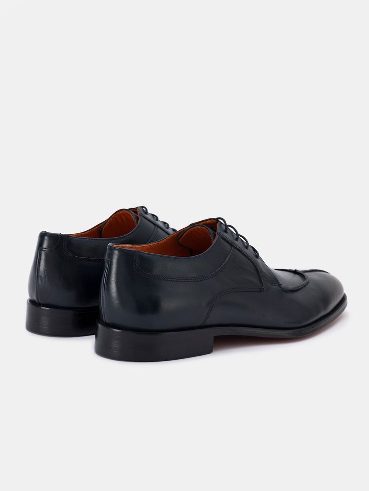 Color: navy Calf leather with natural finish Leather insoles Rubber and leather soles Traditional lace-up closure Hand-stitched detailing Classic Blue Leather Lace-up Shoes, Leather Lace-up Shoes With Plain Toe And Leather Sole, Navy Round Toe Oxfords For Business, Navy Leather Shoes With Rubber Sole For Business, Classic Leather Lace-up Shoes With Stitched Sole, Blue Classic Lace-up Shoes With Plain Toe, Timeless Leather Lace-up Shoes With Leather Lining, Navy Plain Toe Oxfords For Formal Occasions, Navy Dress Shoes With Rubber Sole For Business