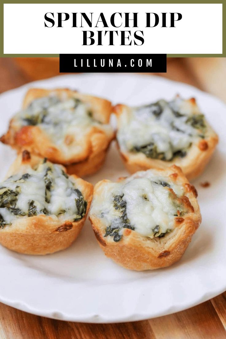 spinach dip bites on a white plate with text overlay that reads spinach dip bites