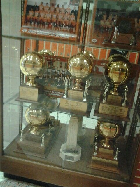 there are many trophies on display in the case