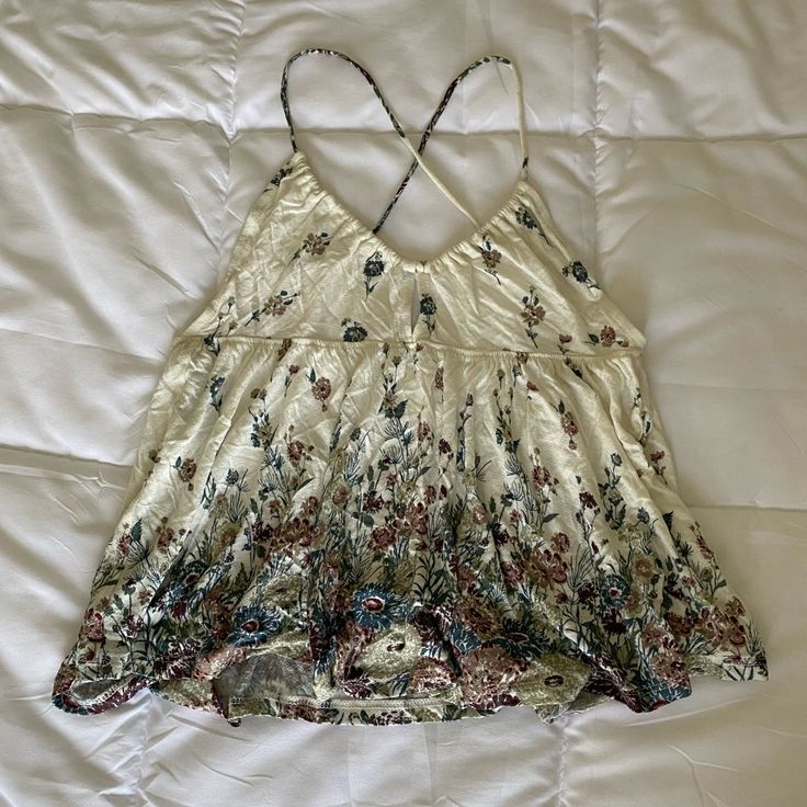 Urban Outfitters Women’s Open Back Crisscross Tank Top. Floral With Key Hole In The Front. Never Worn. Size M But Fits Closer To A Small Vacation Tank Top With Crisscross Straps, Spring Crisscross Strap Tank Top, Summer Beach Tank Top With Cross Back, Casual Flowy Spaghetti Strap Top, Summer V-neck Rayon Tops, White Summer Top With Crisscross Straps, Sleeveless Tank Top With Crisscross Straps For Vacation, Flowy Camisole Top For Vacation, Flowy Summer Camisole Tops