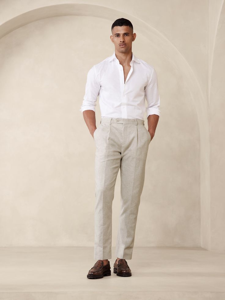 Designed with warm climates in mind, this sleek white suit pant is cut from an herringbone fabric that blends together soft cotton and luxurious linen.  Tailored Slim Fit: Mid-rise.  Tapered slim leg.  Zip fly with button-tab waistband.  Belt loops and after-dinner split detail at back.  Front and back pockets.  Half lined (lined to the knee).  Tailored Slim Fit: Mid-rise.  Tapered slim leg.  Inseams: Short 29. 5", Regular 31. 5", Long 33. 5" Model: Size 32 Regular, 6'2" (188cm). Mens Wedding Guest Outfit, Wedding Guest Outfit Men, Wedding Guest Men, Beach Formal, Linen Pants Suit, Cocktail Attire Men, Formal Wedding Attire, Party Outfit Men, Rehearsal Dinner Outfits