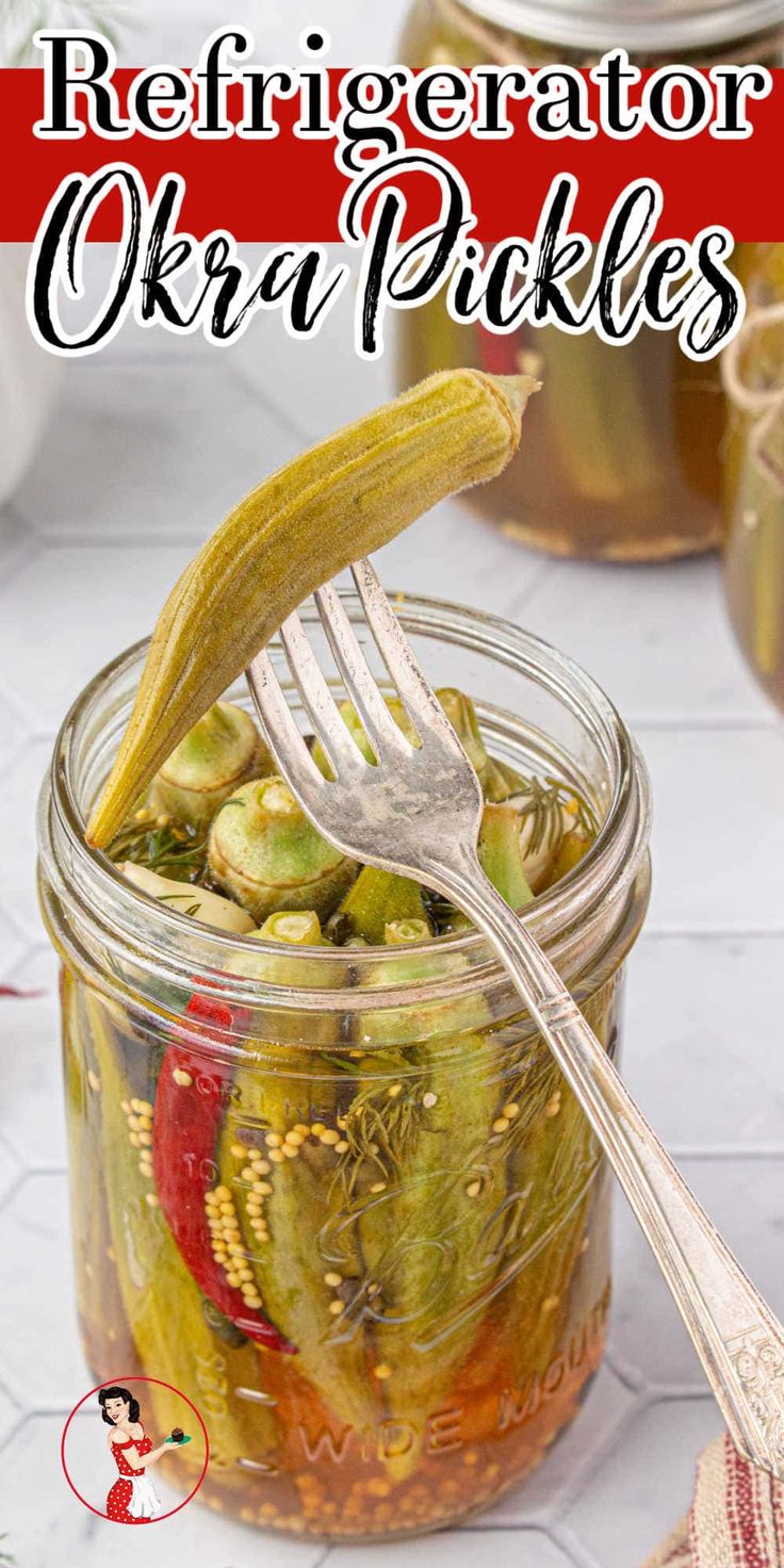 a jar filled with pickles and topped with a fork