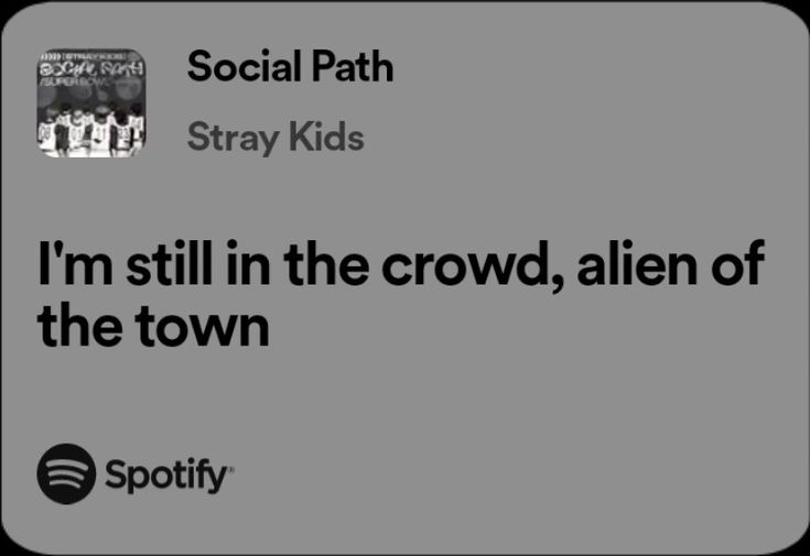 an ad for spotify with the caption'i'm still in the crowd, alien of the town '