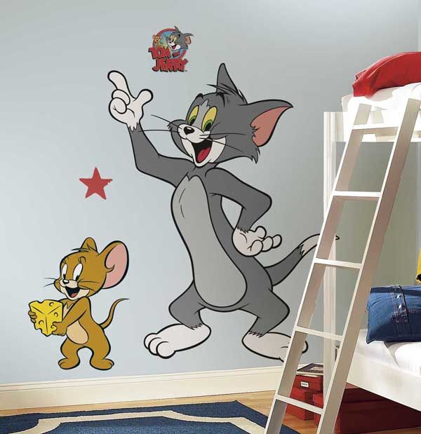 the cat and mouse wall decals are in a child's room